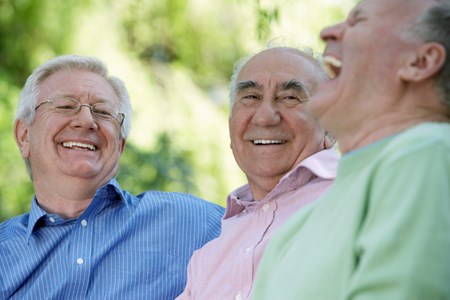 Elderly men laughing