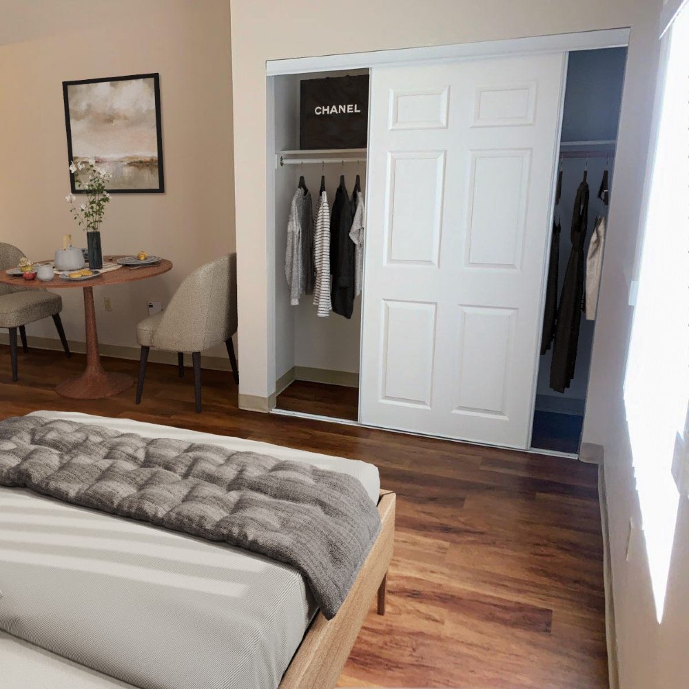 Photo of bedroom & closet in assisted living studio for seniors